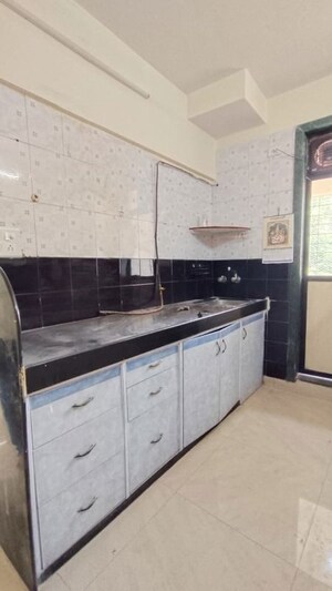 Kitchen in 2 BHK Apartment at Raj Rudram Apartments, Goregaon East – for Rent