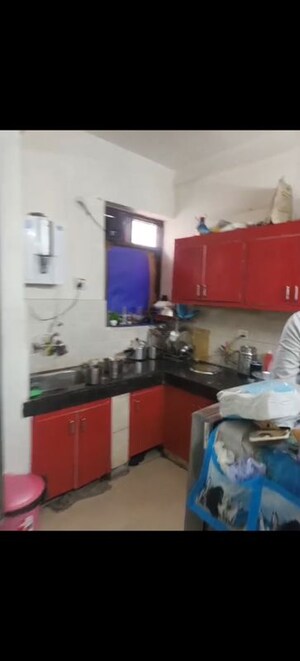 Kitchen in 2 BHK Apartment at High End Paradise II, Raj Nagar Extension – for Sale