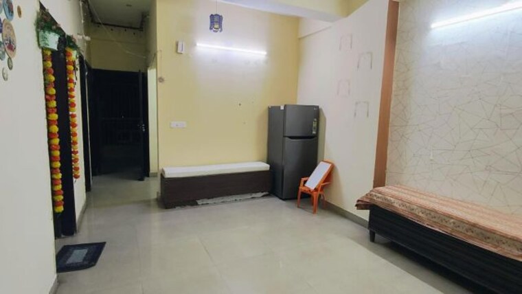 Living Room, ansal-golf-link-i 2 Bedroom 985 Sq.Ft. Apartment In Omega I Greater Noida Greater Noida 10160161