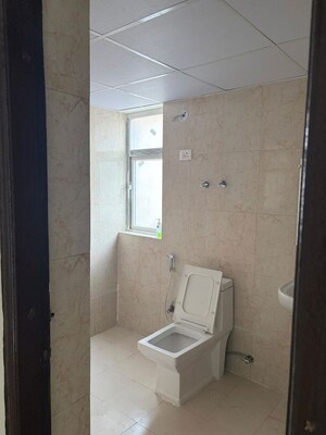 Bathroom in 3.5 BHK Apartment at Amrapali Heartbeat City, Sector 107 – for Rent