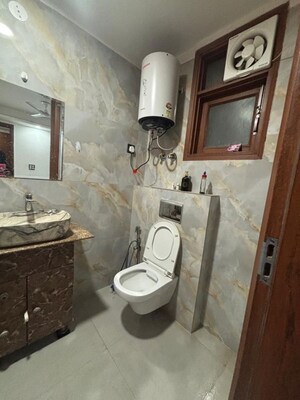 Bathroom in 3 BHK Builder Floor at Freedom Fighters Enclave – for Rent