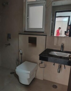 Bathroom in 4 BHK Apartment at Rishita Manhattan, Gomti Nagar – for Rent