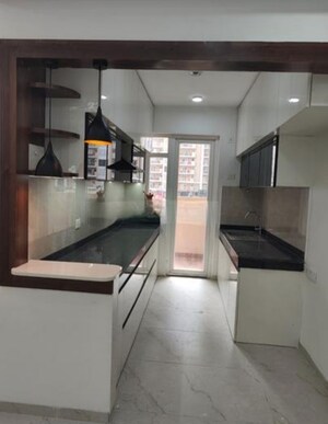 Kitchen in 4 BHK Apartment at Rishita Manhattan, Gomti Nagar – for Rent