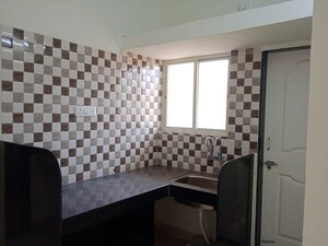 Kitchen in 1 BHK Apartment at Wadgaon Sheri – for Rent