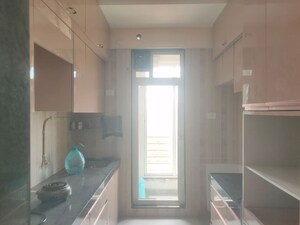 Kitchen in 2 BHK Apartment at Raunak Residency Thane, Pokhran Road No One – for Rent