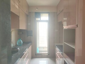 Kitchen in 2 BHK Apartment at Raunak Residency Thane, Pokhran Road No One – for Rent