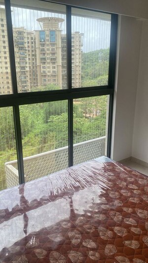 Bedroom in 2 BHK Apartment at Godrej Urban Park, Chandivali – for Rent