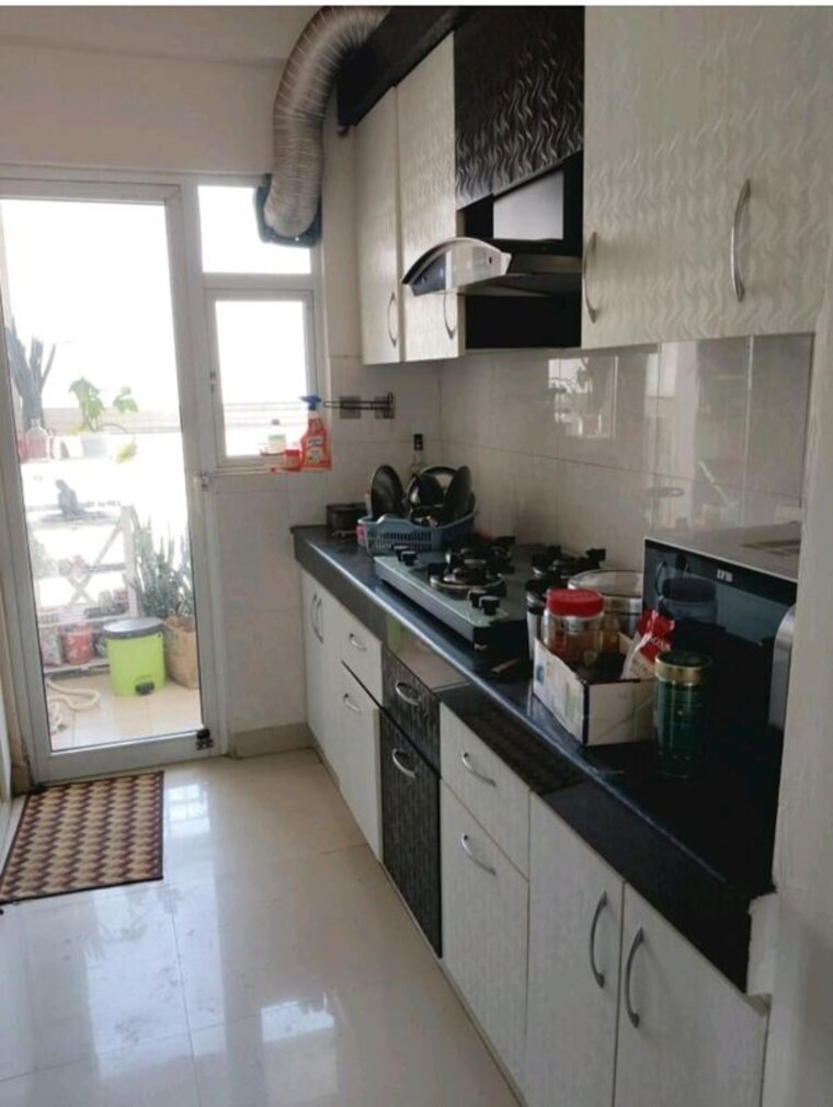 Kitchen, gaur-city-5th-avenue 2 Bedroom 910 Sq.Ft. Apartment In Sector 4 Greater Noida Greater Noida 10161191