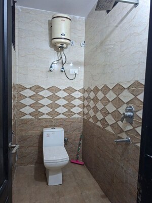 Bathroom in 3 BHK Apartment at Unitech Uniworld Gardens, Sector 47 – for Rent