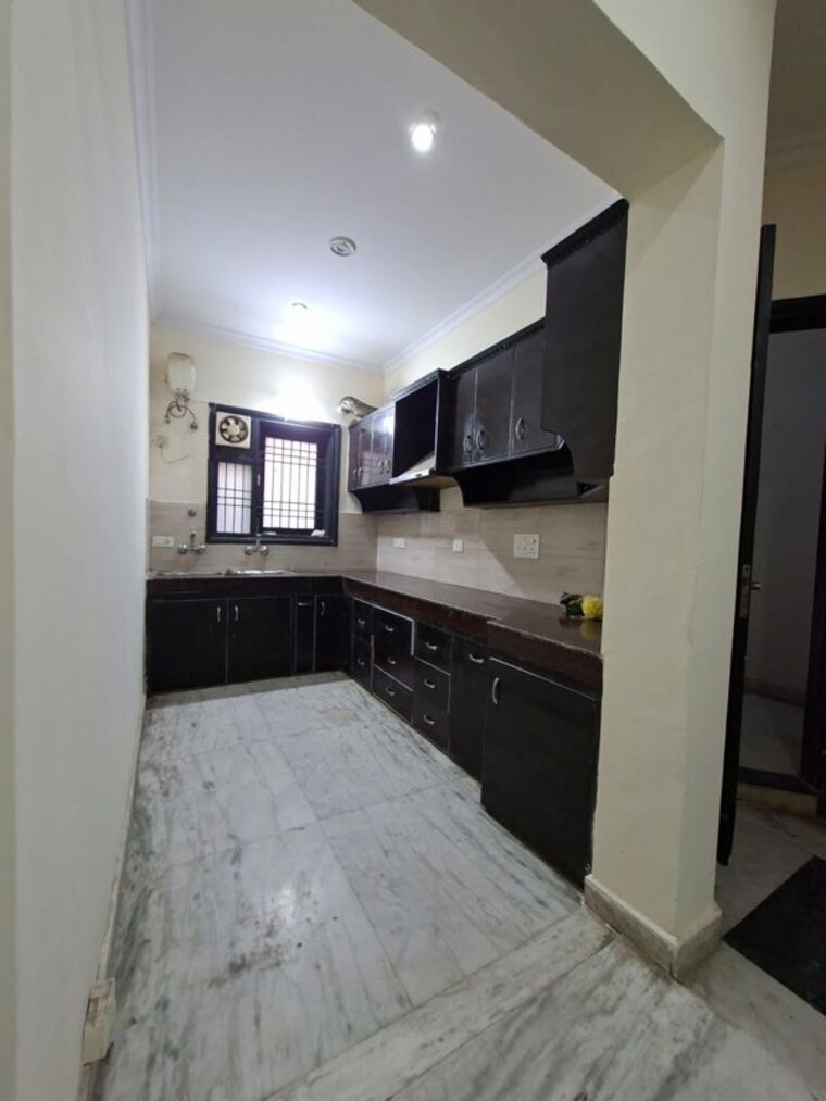 Kitchen, unitech-uniworld-gardens 3 Bedroom 1770 Sq.Ft. Apartment In Sector 47 Gurgaon 10161475