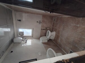 Bathroom in 2 BHK Apartment at Urbtech Xaviers, Sector 168 – for Rent