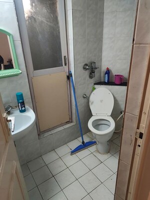 Bathroom in 2 BHK Apartment at Hiranandani Garden Brentwood, Powai – for Rent
