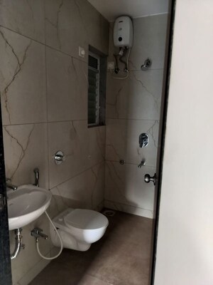 Bathroom in 1 BHK Apartment at Puranik Hometown, Ghodbunder Road – for Rent