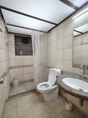 Bathroom in 3 BHK Apartment at Atur Park, Koregaon – for Rent