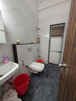 Bathroom in 2 BHK Apartment at Larkins Pride Palms, Kolshet Road – for Sale