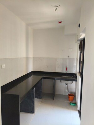 Kitchen in 2 BHK Apartment at Runwal Gardens Phase 2, Dombivli East – for Rent