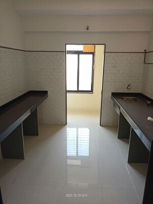 Kitchen in 2 BHK Apartment at S A Samarth Garden Wings F And G, Bhandup West – for Sale