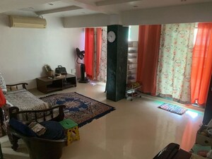 Living Room in 4 BHK Apartment at Kasba Peth – for Sale