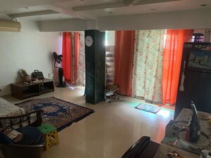 Living Room in 4 BHK Apartment at Kasba Peth – for Sale