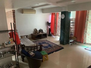 Living Room in 4 BHK Apartment at Kasba Peth – for Sale