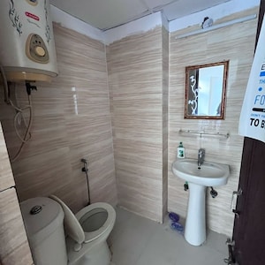 Bathroom in 3 BHK Apartment at Amrapali Zodiac, Sector 120 – for Sale