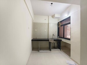 Building Lobby in 1.5 BHK Apartment at Shah Arcade, Kharghar – for Sale