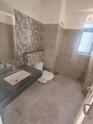 Bathroom in 3.5 BHK Apartment at Tulsiani Golf View, Gomti Nagar – for Rent