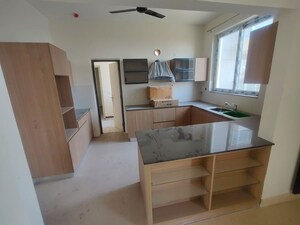 Kitchen in 3.5 BHK Apartment at Tulsiani Golf View, Gomti Nagar – for Rent