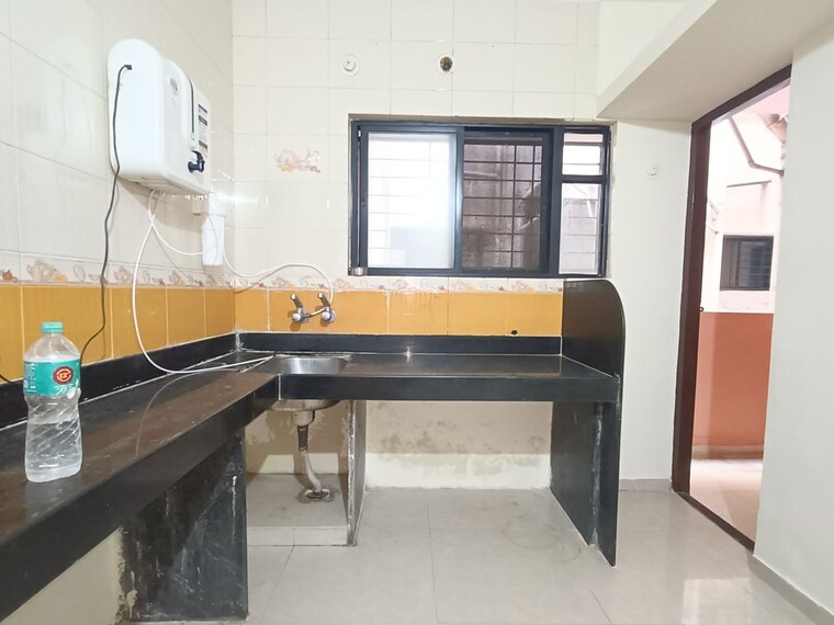 Kitchen, adarsh colony 2 Bedroom 950 Sq.Ft. Apartment In Adarsh Colony Pune 10163047
