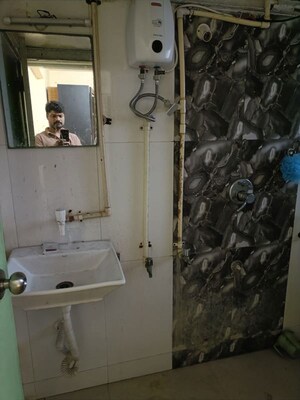 Bathroom in 2 BHK Apartment at Royal Palms Diamond Isle Phase I, Goregaon East – for Rent