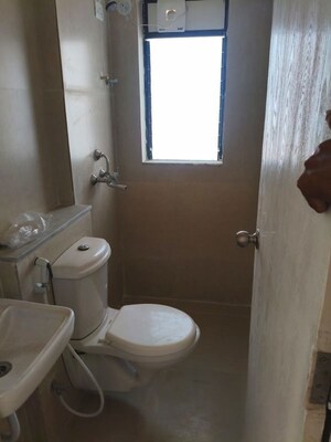 Bathroom in 2 BHK Apartment at Runwal Gardens Phase 2, Dombivli East – for Rent