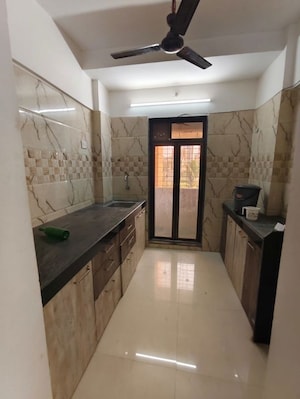 Kitchen in 1 BHK Apartment at Sai Gangat Apartment, Kasarvadavali – for Rent
