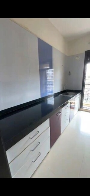 Kitchen in 2 BHK Apartment at Hyde Park CHS, Kharghar – for Rent