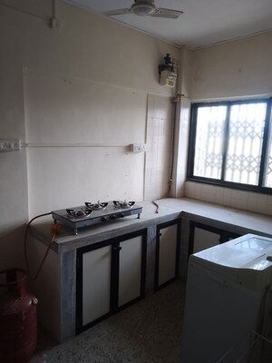 Kitchen in 1 RK Apartment at Panchvan Complex, Borivali West – for Rent