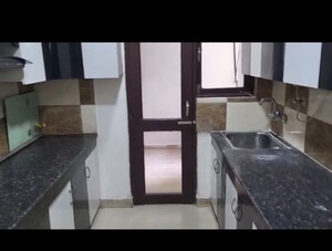 Kitchen in 4 BHK Apartment at Vasu Fortune Residency, Raj Nagar Extension – for Sale