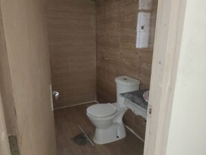 Bathroom in 3 BHK Apartment at Amrapali Crystal Homes, Sector 76 – for Sale