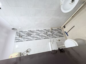 Bathroom in 1 BHK Builder Floor at Khirki Extension – for Rent