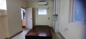 Kitchen in 1 BHK Apartment at Dharam Jyot CHS, Juhu – for Rent