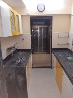 Kitchen in 2 BHK Apartment at Hubtown Greenwoods, Vartak Nagar – for Rent