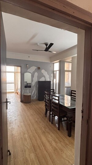 Living Room in 2 BHK Apartment at Migsun Green Mansion, Zeta I Greater Noida – for Rent