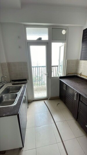 Kitchen in 2 BHK Apartment at Truvae Fragrance, Siddharth Vihar – for Sale