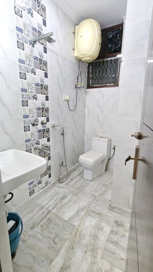 Bathroom in 2 BHK Builder Floor at Malviya Nagar – for Sale
