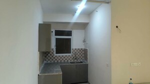 Kitchen in 2 BHK Apartment at Mahagun Mantra II, Sector 10 Greater Noida – for Rent