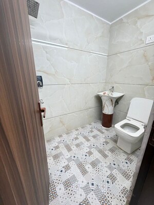 Bathroom in 3 BHK Builder Floor at Dwarka Mor – for Rent