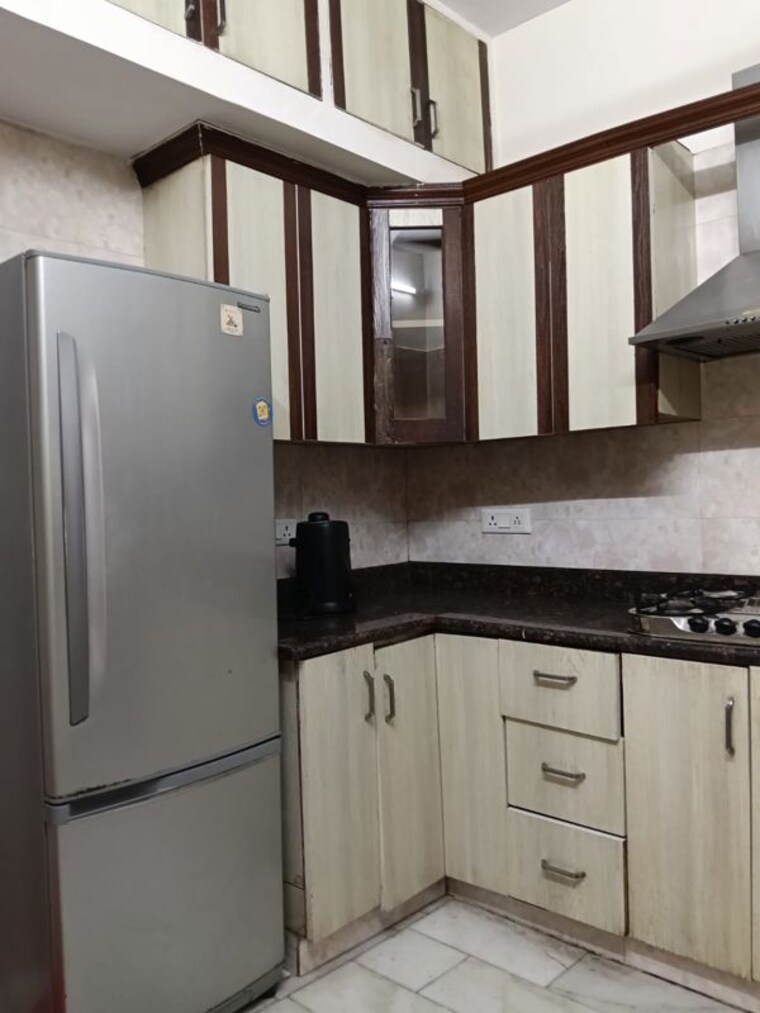 Kitchen, pamposh enclave 3 Bedroom 260 Sq.Yd. Builder Floor In Pamposh Enclave Delhi 10164266