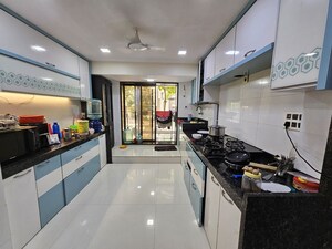 Kitchen in 4 BHK Apartment at Gaurav Enclave I, Mira Road – for Sale
