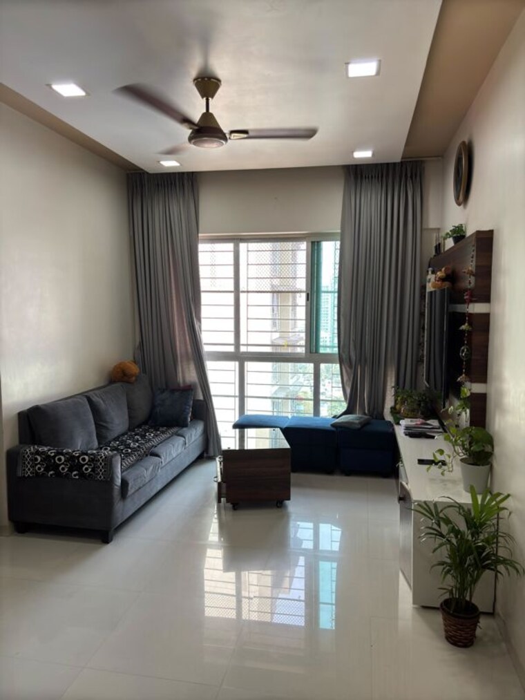 Living Room, hubtown-gardenia 2 Bedroom 930 Sq.Ft. Apartment In Mira Road Thane 10164329