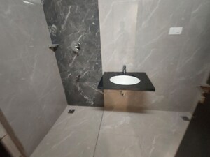 Bathroom in 3 BHK Apartment at Aparna Zenon, Puppalaguda – for Rent