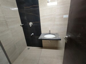 Bathroom in 3 BHK Apartment at Aparna Zenon, Puppalaguda – for Rent