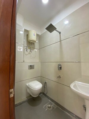 Bathroom in 3 BHK Builder Floor at Rajpur Khurd Extension – for Sale